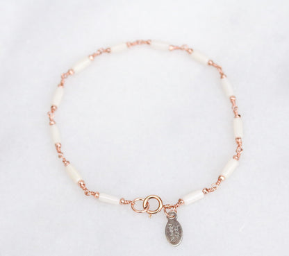 White Sea Bamboo Bracelet: Rose Gold Karen Hill Tribe Beads