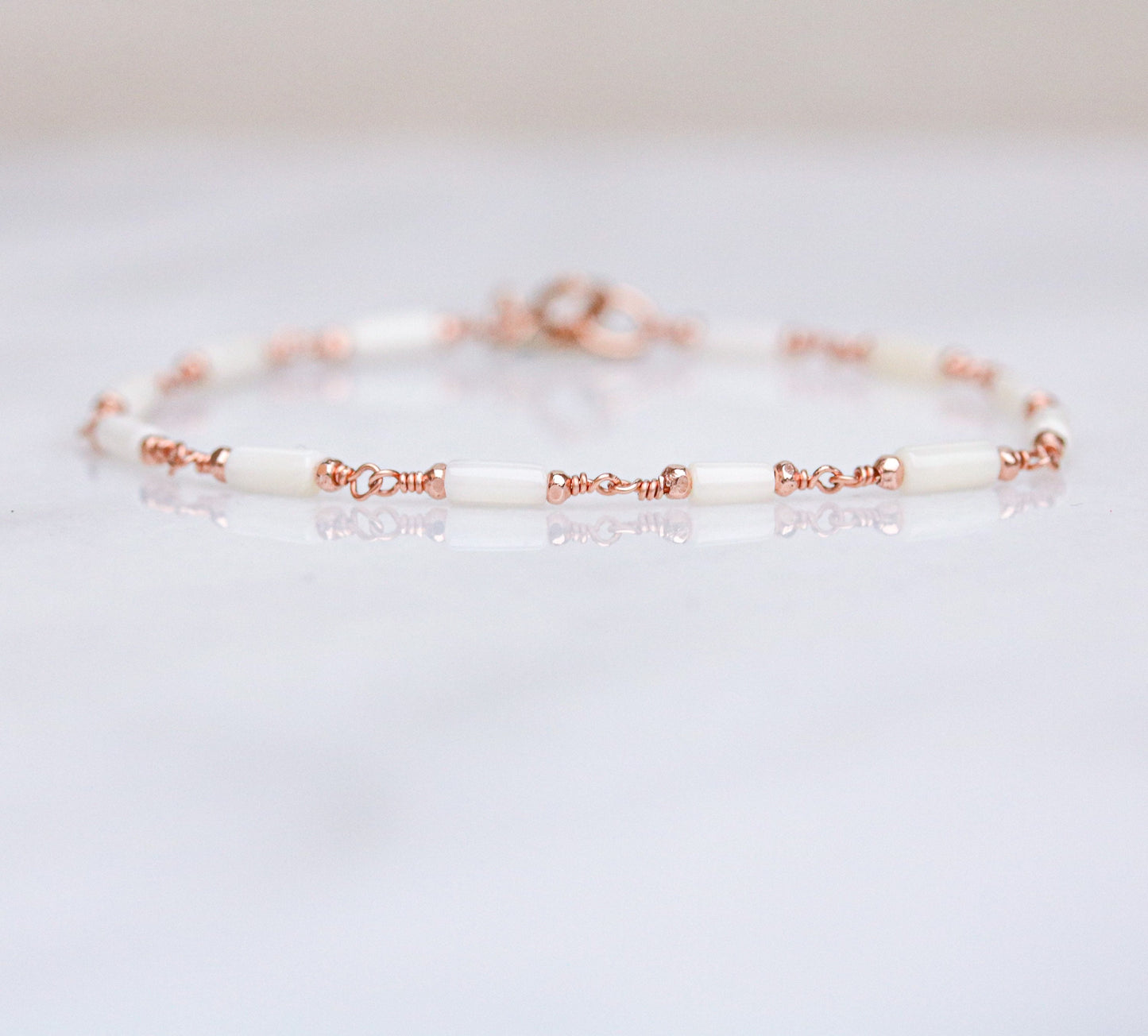 White Sea Bamboo Bracelet: Rose Gold Karen Hill Tribe Beads